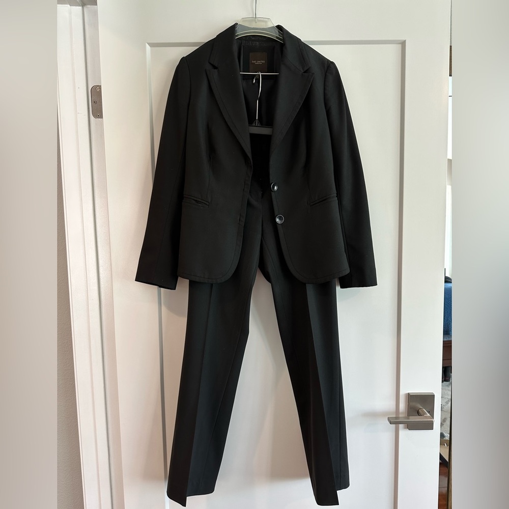 The limited women’s black suit set (jacket and pants)
